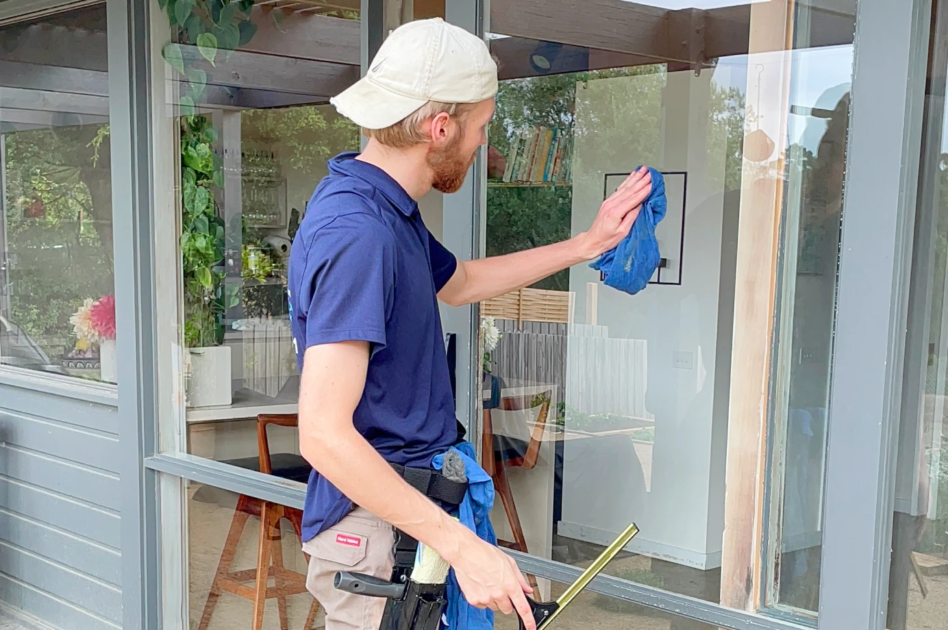 James Barton Cleaning windows close up